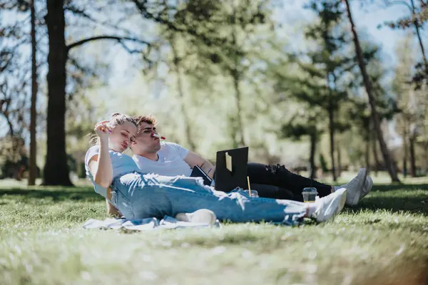Affectionate Young Students Studying Relaxing Outdoors Enjoying Beautiful Day Park Stock Image