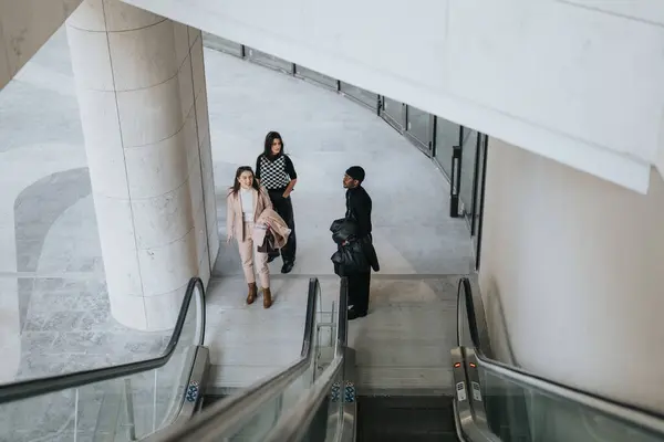 Three Young Business Partners Captured Using Escalator Contemporary Office Environment — Stock Photo, Image