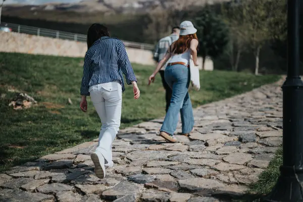Two Women Walking Cobblestone Path Enjoying Sunshine Company Depicting Friendship — Stock Photo, Image
