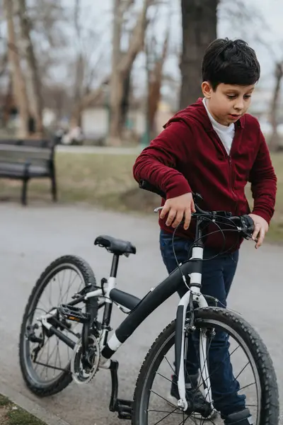Young Kid Appears Joyful Active While Riding His Bike Park Imagem De Stock