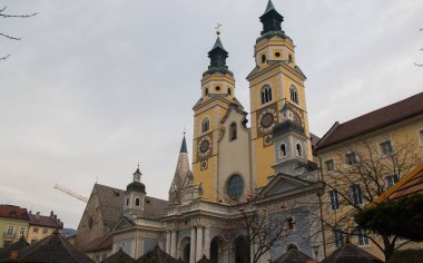 View of Duomo of Bressanone on a cloudy winter morning during christmas time. Province of Bolzano, Trentino Alto Adige, Italy