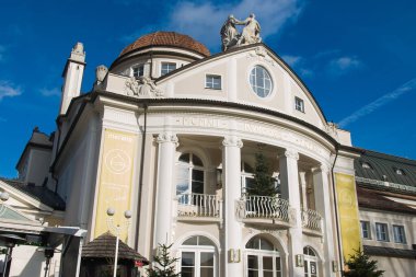 MERANO, ITALY - DECEMBER 27, 2022: View of Kurhaus in Meran, is a famous building and a symbol of Merano town in South Tyrol in northern Italy
