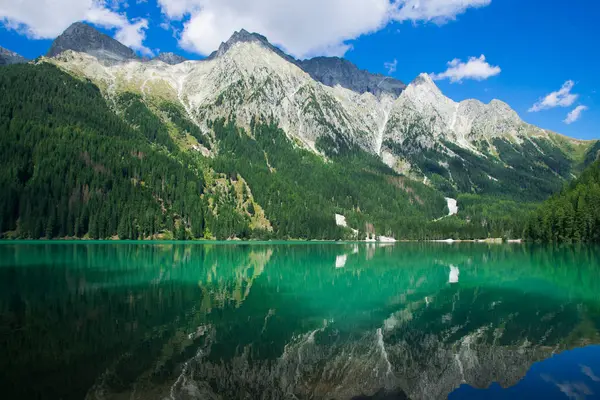 Magic landscape with peaceful alpine lake in Trentino Alto-Adige, Italy, Europe