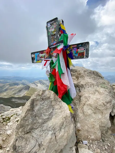 stock image View of the peak cross located in the summit of Corno Grande, Massif of Gran Sasso, Abruzzo region, Italy