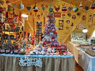 MOMBAROCCIO, ITALY - NOVEMBER 23, 2024: A traditional christmas tree in the medieval center of Mombaroccio village, Marche region clipart