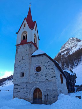 The Church of Santo Spirito is probably one of the most evocative pilgrimage destinations in South Tyrol at the end of the Valle Aurina clipart