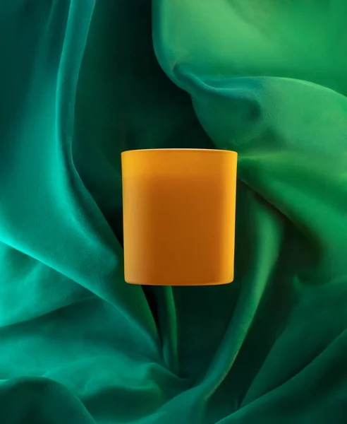 Yellow Aromatic Candle Green Suede Fabric Background Stock Photo