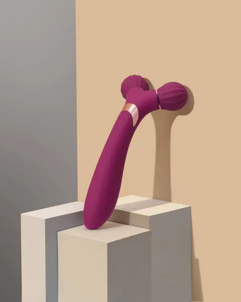 Ergonomic Massage Device Vibrator Couples Purple Presented Minimalist Geometric Stand — Stock Photo, Image