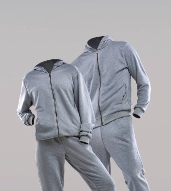 Fermuarlı kapüşonlu ve eşofmanlı modern gri spor giyim seti, görünmez mankenler üzerinde zarifçe sergilenir. Minimalist tasarım rahatlığı ve tarzı vurgular..