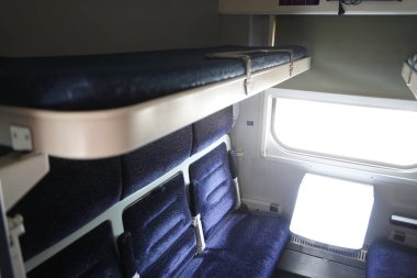 Almaty, Kazakistan - 05.20.2022 - Şilteli ve yataklı yolcular için koltuklar.