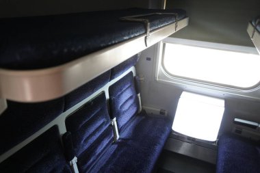 Almaty, Kazakistan - 05.20.2022 - Şilteli ve yataklı yolcular için koltuklar.