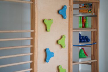 Almaty, Kazakhstan - 10.12.2022 : A kindergarten room with decorative elements, educational toys and inventory.