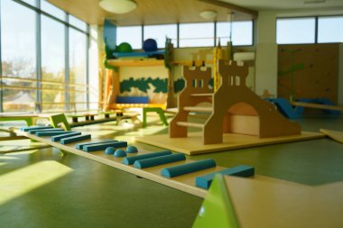 Almaty, Kazakhstan - 10.12.2022 : A kindergarten room with decorative elements, educational toys and inventory.