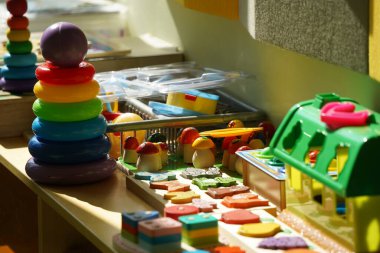 Almaty, Kazakhstan - 10.12.2022 : A kindergarten room with decorative elements, educational toys and inventory.