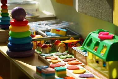 Almaty, Kazakhstan - 10.12.2022 : A kindergarten room with decorative elements, educational toys and inventory.