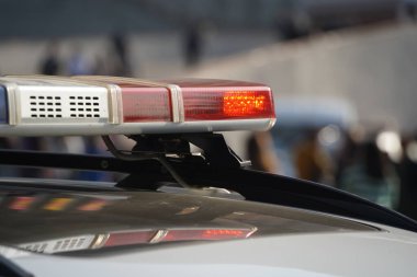 Almaty, Kazakhstan - 09.16.2022 : A Kazakh police car with flashing lights on patrol in a public place.