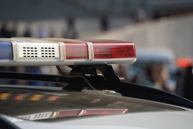 Almaty, Kazakhstan - 09.16.2022 : A Kazakh police car with flashing lights on patrol in a public place.