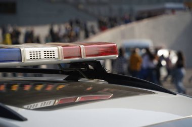 Almaty, Kazakhstan - 09.16.2022 : A Kazakh police car with flashing lights on patrol in a public place.