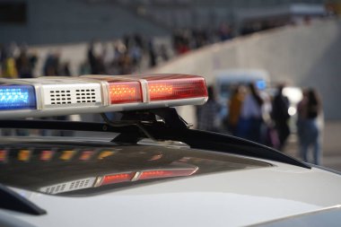 Almaty, Kazakhstan - 09.16.2022 : A Kazakh police car with flashing lights on patrol in a public place.