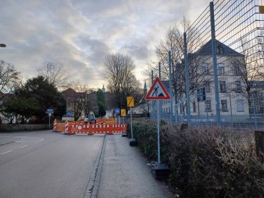 RAVENSBURG, GERMANY - JANUARY 14, 2023: Underground utilities are being repaired on the streets of Ravensburg