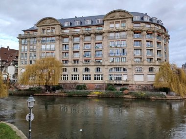 STRASBOURG, FRANCE - JANUARY 5, 2023: On the quai Saint-Etienne at the confluence of the Faux-Rempart canal and the Ile river