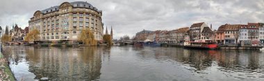 STRASBOURG, FRANCE - JANUARY 5, 2023: On the quai Saint-Etienne at the confluence of the Faux-Rempart canal and the Ile river