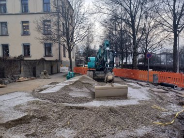 RAVENSBURG, GERMANY - JANUARY 28, 2023: Underground utilities are being repaired on the streets of Ravensburg