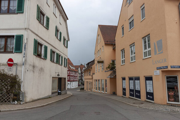 PFULLENDORF, GERMANY - APRIL 7, 2023: Cosy street in picturesque town Pfullendorf in Germany. Traditional old german houses