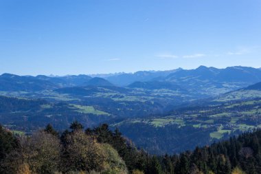 Beautiful green Alp mountains and hills from Pfaender Mountain in Bregenz, Vorarlberg, Austria.