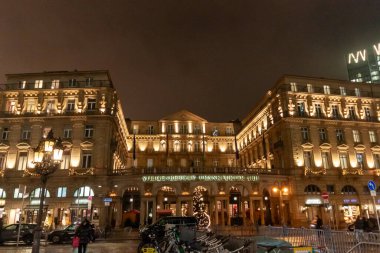 FRANKFURT, GERMANY - DECEMBER 2. 2024: Steigenberger Frankfurter Hof hotel in Frankfurt, Germany at night clipart