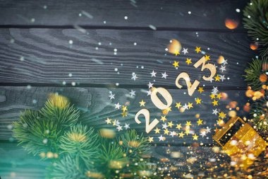 2023 yılbaşı arkaplanı. Mevsimlik ambalaj ve Yeni Yıl Öznitelikleri