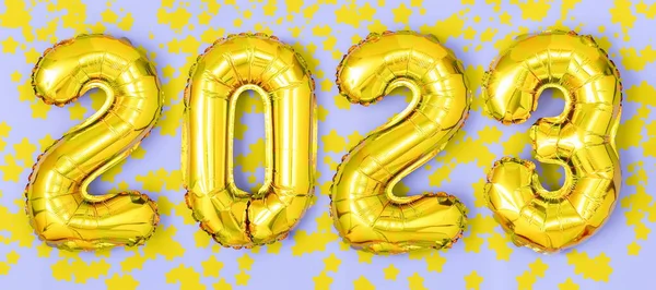 2023 Golden Foil Balloons Numbers Stars Confetti Ribbons Bokeh Top — Stock Photo, Image
