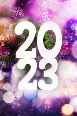 Christmas or New years eve; holiday background , Winter xmas holiday theme. Christmas tree on green background. Merry Christmas and Happy Holidays greeting card, frame, banner.