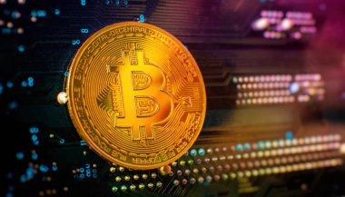 Bitcoin cryptocurrency new version on computer electronic circuit board background . Virtual cryptocurrency money Bitcoin golden