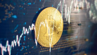 Blockchain technology bitcoin mining concept. Bitcoin golden coin on computer circuit board. banner copy space