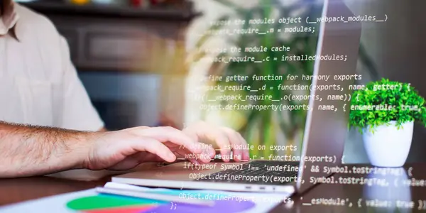 stock image Programmer working with a computer in the office. Close-up of a man's hands typing on a keyboard. Abstract IT