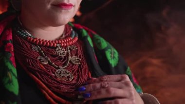 Demonstrating traditional antique jewelry necklace. National costume of Ukraine. Ukrainian woman in legacy ancient coral beads, Zgarda - archaic hutsul neck ornament of status religious purpose. 4k