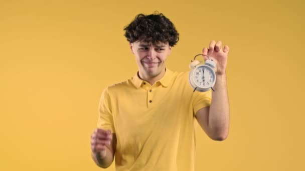 Woken Alarm Clock Sleepy Man Holding Hand Yellow Background Early — Stock Video