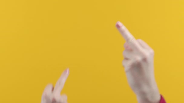 Rude Woman Yellow Background Showing Middle Finger Gesture Fuck Expression — 图库视频影像