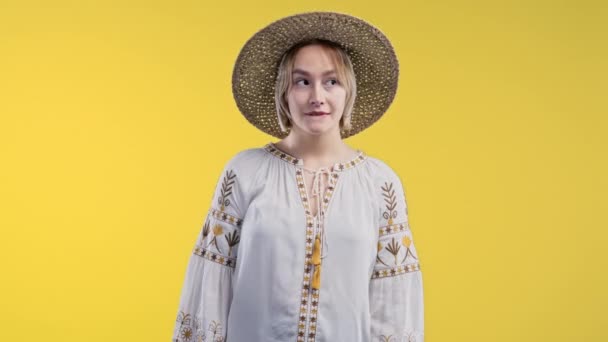 Smiling Ukrainian Woman Holding Finger Lips Yellow Studio Background Pretty — Vídeo de stock