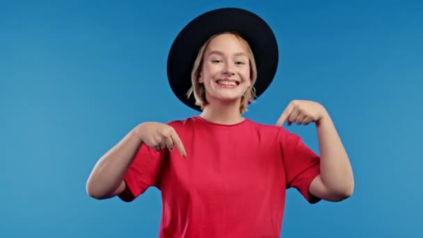 Happy Woman Pointing Advertising Area Blue Background Young Lady Asking — Vídeo de Stock