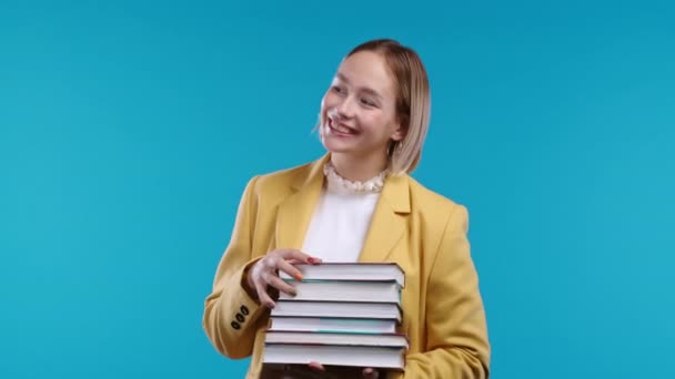 Clever Student Holds Stack University Books College Library Blue Background — Stok video