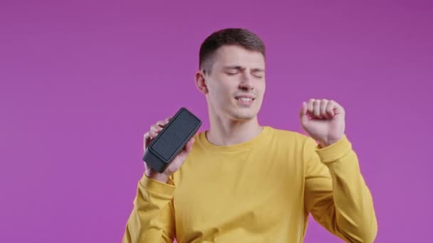 Man Dancing Enjoying Pink Studio Background Guy Moves Rhythm Music — Stock Video