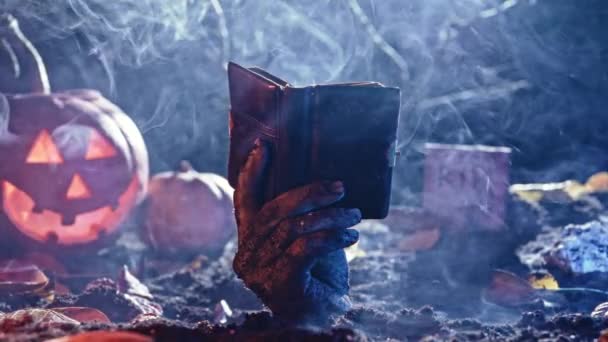 Zombie Hand Old Book Reading Intellectual Undead Happy Halloween Sale — Stock Video