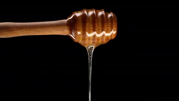Natuurlijke Houten Honinglepel Dipper Stick Met Druppelende Bloem Gezonde Nectar — Stockvideo