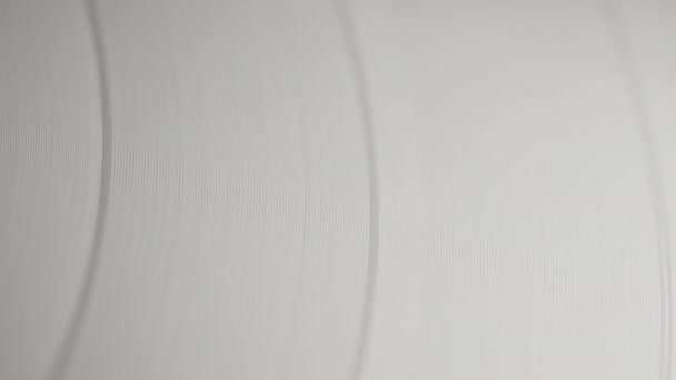 マクロは白い回転ビニールの記録の溝をテクスチャしました ミュージックノスタルジア 視覚的なオーバーレイに最適です レトロバイブ ヴィンテージ美学 高品質の4K映像 — ストック動画