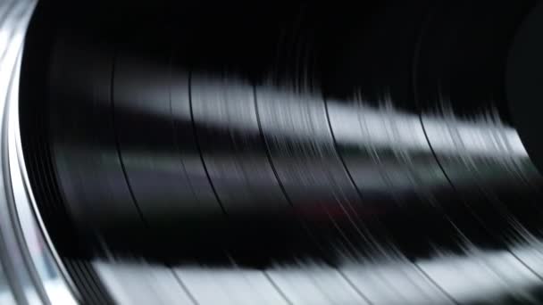 マクロは回転するビニールの記録の溝をテクスチャしました ミュージックノスタルジア 視覚的なオーバーレイに最適です レトロバイブ ヴィンテージ美学 高品質の4K映像 — ストック動画