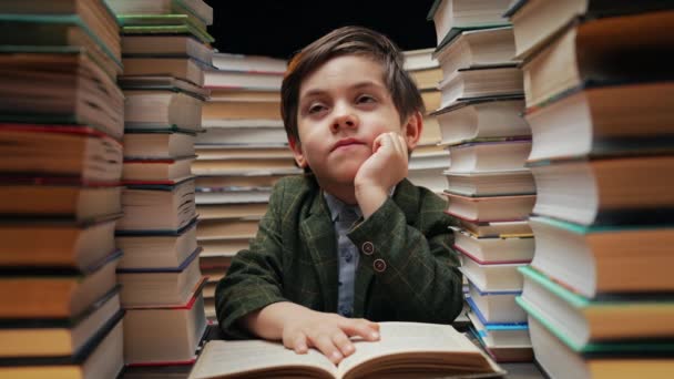 Dreamy Little Boy Sitting Classroom Library Desk Smart Child Thinking — Stock Video