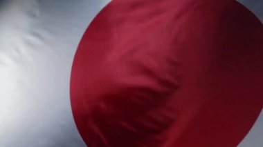 Gerçek bir Japon bayrağı sallanıyor. Kutlama afişi, tatiller, Japonya. Ulusal Kuruluş Günü, Spor Günü, Çocuklar Günü. Yüksek kalite 4k görüntü