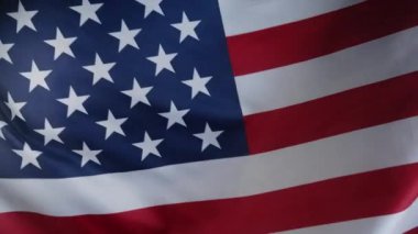 Ulusal Amerikan bayrağı sallayarak. Stars Stripes. Demokrasinin, bağımsızlığın, ABD 'nin, 4 Temmuz kutlamalarının, ABD bayrağının, gazilerin, seçimlerin, Amerika' nın, işçilerin sembolü. Yüksek kalite 4k